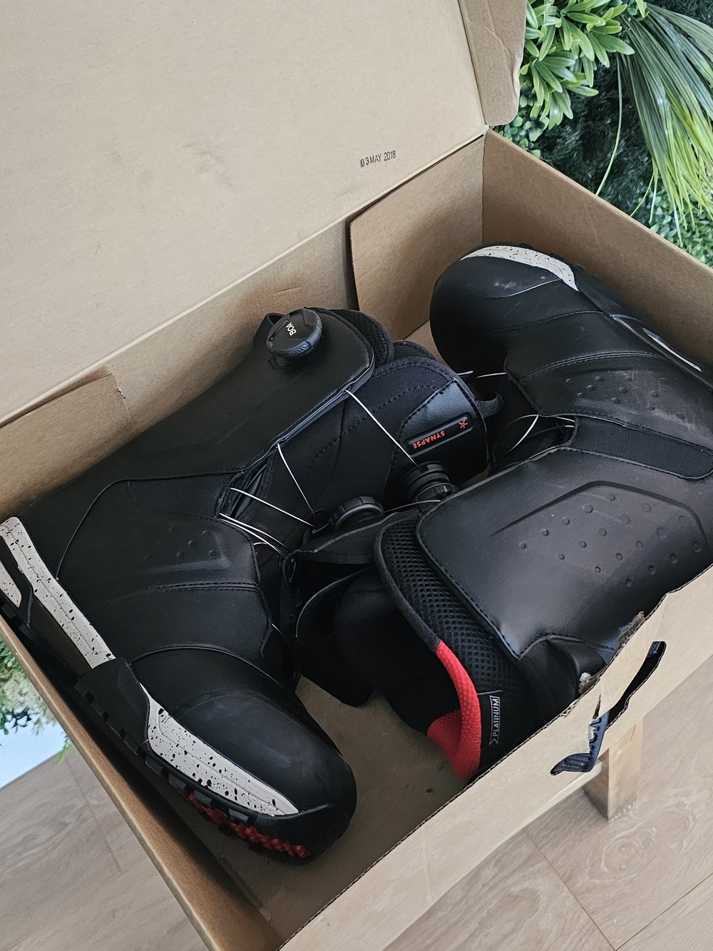 Salomon Black Snowboard Boots with Red Interior Accents